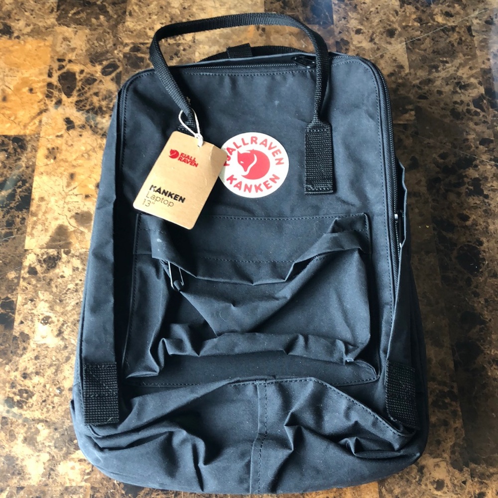 Fjallraven Kanken 13in laptop bag.